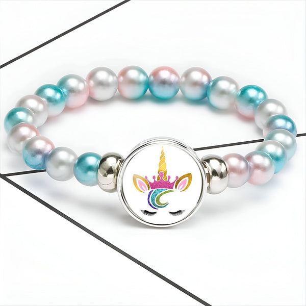 Bracelet enfant avec perles roses, bleues et blanches, et un pendentif licorne coloré., 45501400776959 | Licorne Shop