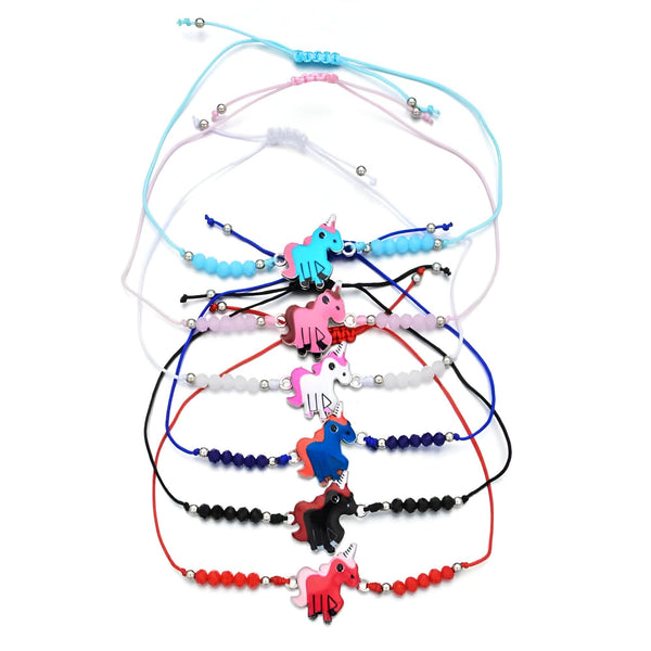 Ensemble de 7 bracelets colorés avec des perles et un motif licorne. Les couleurs incluent bleu, rose, blanc, noir et rouge. Idéal pour les cadeaux d'amitié ou les accessoires de mode fantaisie., 45501422108927 | Licorne Shop