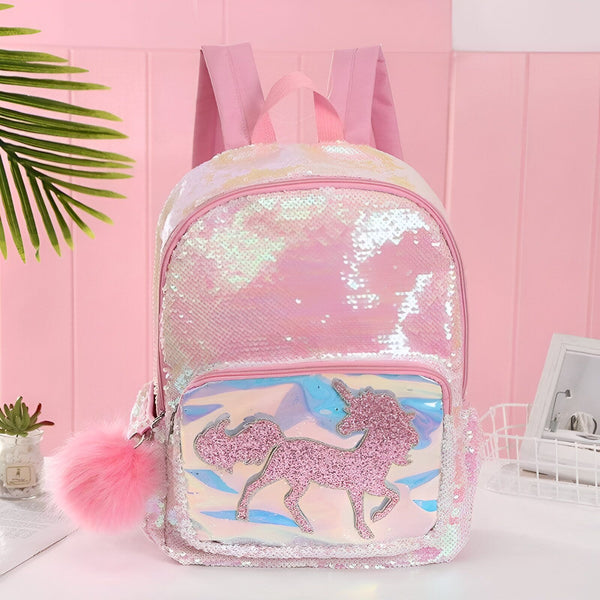 Un sac à dos rose à paillettes avec une image de licorne.