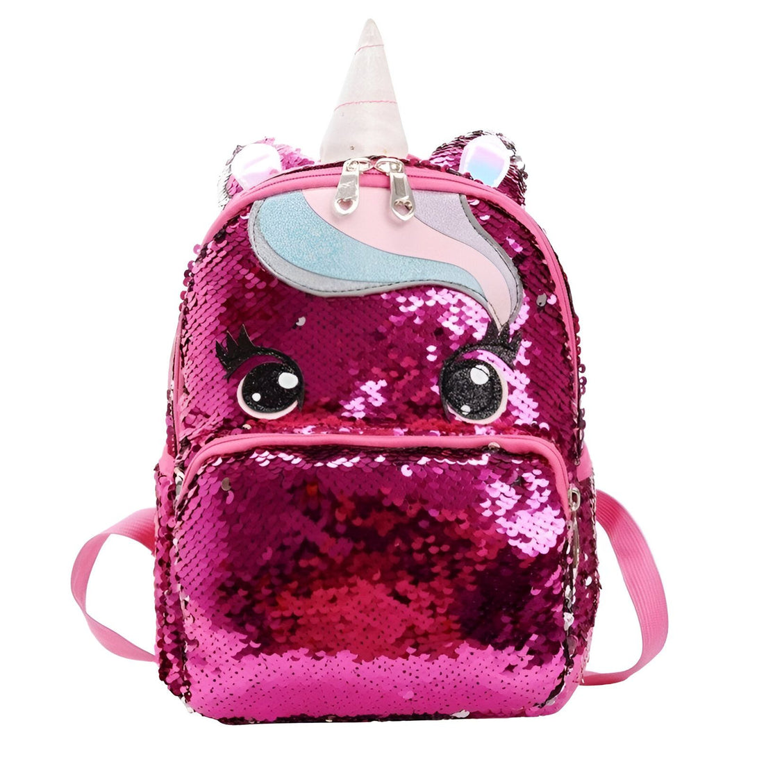 Un sac à dos rose en forme de licorne avec des paillettes réversibles.