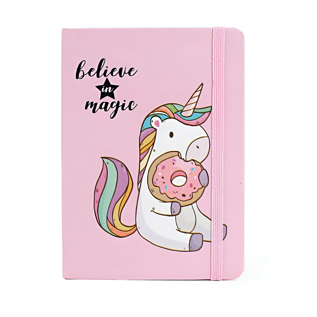 Carnet rose avec un dessin de licorne mangeant un donut et l'inscription "Believe in magic"., 45501156819199 | Licorne Shop