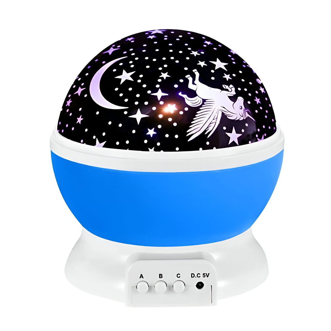 Une veilleuse en forme de boule bleue avec une licorne et une lune. La boule est éclairée par des LED et projette des étoiles et des lunes sur le plafond.