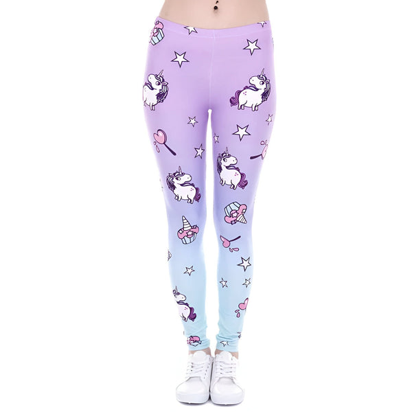 Leggings violet et bleu pastel avec motifs d'unicorne, d'étoiles et de confiseries. Une personne porte les leggings et des chaussures blanches. Style fantaisiste et coloré., 45501887217919,45501887447295,45501887578367,45501887709439,45501887840511,45501887971583,45501888102655,45501888233727 | Licorne Shop