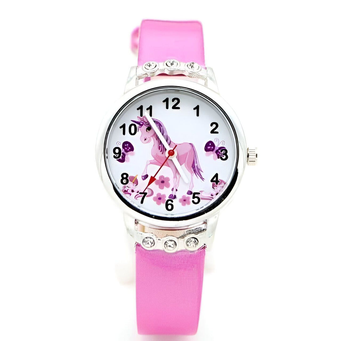 Montre pour enfant avec un bracelet rose et un cadran orné d'un dessin de licorne et de fleurs. Joli accessoire pour apprendre l'heure de manière ludique. Idée cadeau fille., 45501319020799 | Licorne Shop