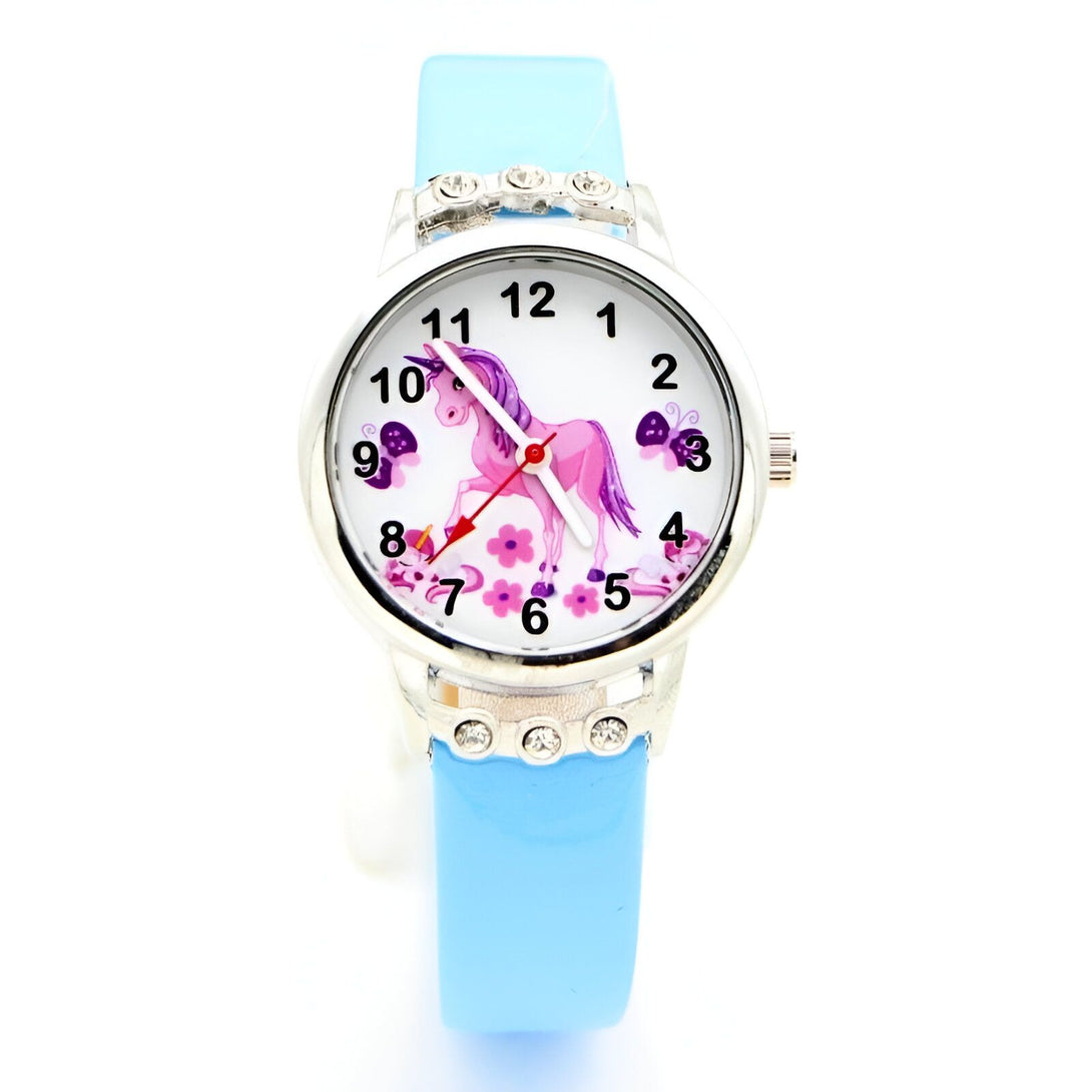 Une montre licorne rose avec un bracelet en cuir bleu.