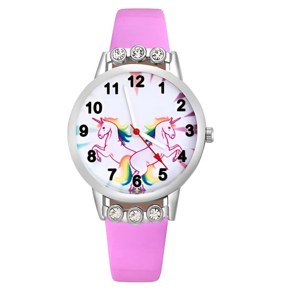 Montre pour enfants rose avec licornes sur le cadran, détails en strass et bracelet rose. Indique 11h23. Accessoire mignon et ludique., 45501129261311 | Licorne Shop