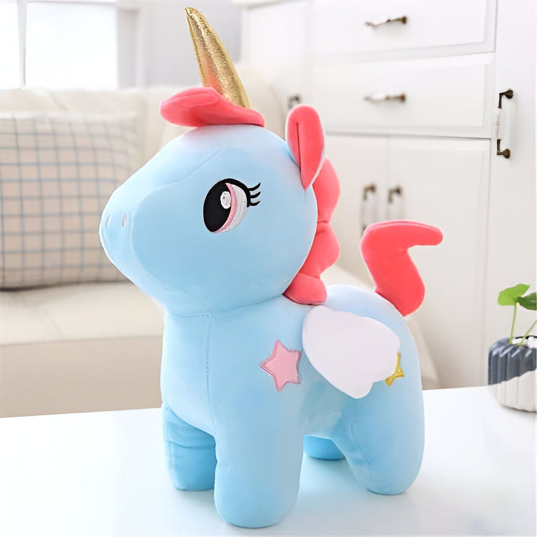 Peluche licorne bleue avec corne dorée, crinière rose, ailes blanches et étoile rose brodée. Jouet mignon pour enfant ou cadeau original., 45501419979007 | Licorne Shop