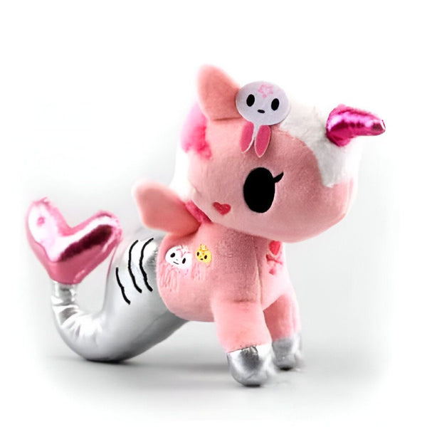Peluche de licorne rose avec queue de sirène argentée, yeux noirs ronds, crinière rose, corne rose, et un motif en forme de crâne sur la tête. Cœur rouge sur le visage et le corps., 45501421322495 | Licorne Shop