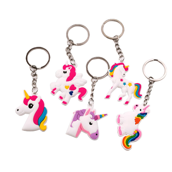 Ensemble de porte-clés licorne colorés en caoutchouc. Motifs variés : licorne ailée, tête de licorne avec crinière arc-en-ciel, licorne cabrée avec queue colorée. Cadeaux fantaisie pour les amoureux des licornes., 45501359554815 | Licorne Shop