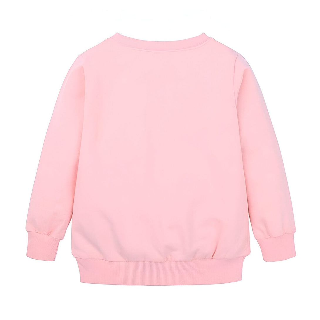 Une image d'un sweat-shirt rose pour enfant avec des manches longues et une encolure ronde.