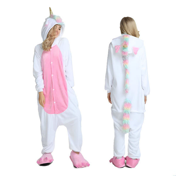 Femme portant un pyjama licorne blanc et rose. Vue de face et de dos, le pyjama a une capuche avec une corne dorée et une crinière arc-en-ciel. La queue est également arc-en-ciel. Elle porte des chaussons assortis., 45502360944895,45502360977663,45502361010431,45502361043199,45502361075967,45502361108735,45502361141503,45502361174271 | Licorne Shop