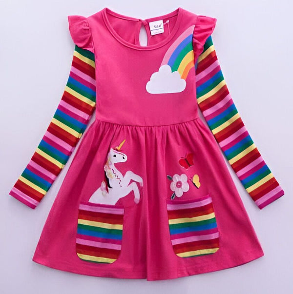 Robe rose pour enfant avec manches rayées multicolores, motif licorne et arc-en-ciel, et poches rayées. Vêtement mignon et coloré., 45501349658879,45501349691647,45501349724415,45501349757183,45501349822719,45501349855487,45501349888255,45501349921023 | Licorne Shop