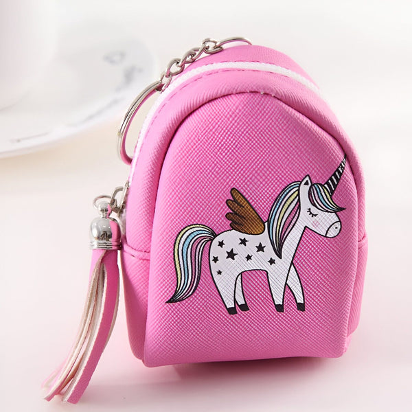 Petit sac à dos rose en forme de bourse avec un imprimé de licorne ailée blanche à rayures arc-en-ciel, agrémenté d'un pompon décoratif. Idéal pour ranger de la petite monnaie., 45501182836991 | Licorne Shop