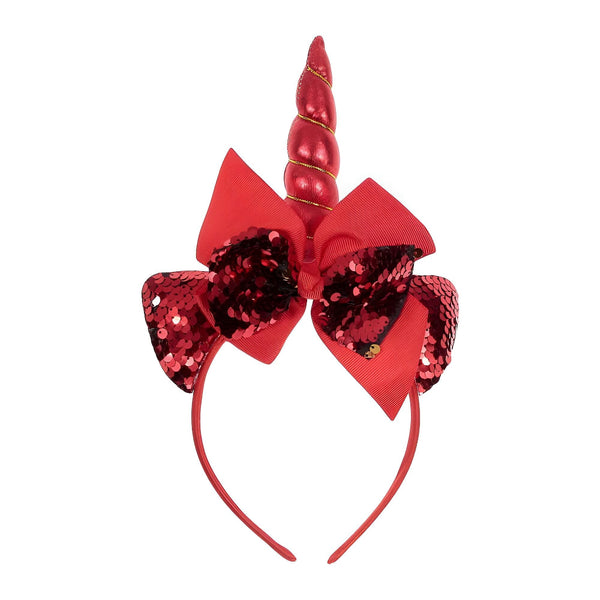 Serre-tête licorne rouge avec un nœud à paillettes. Accessoire de cheveux festif avec une corne brillante. Idéal pour les fêtes d'enfants ou les déguisements., 45501376954623 | Licorne Shop
