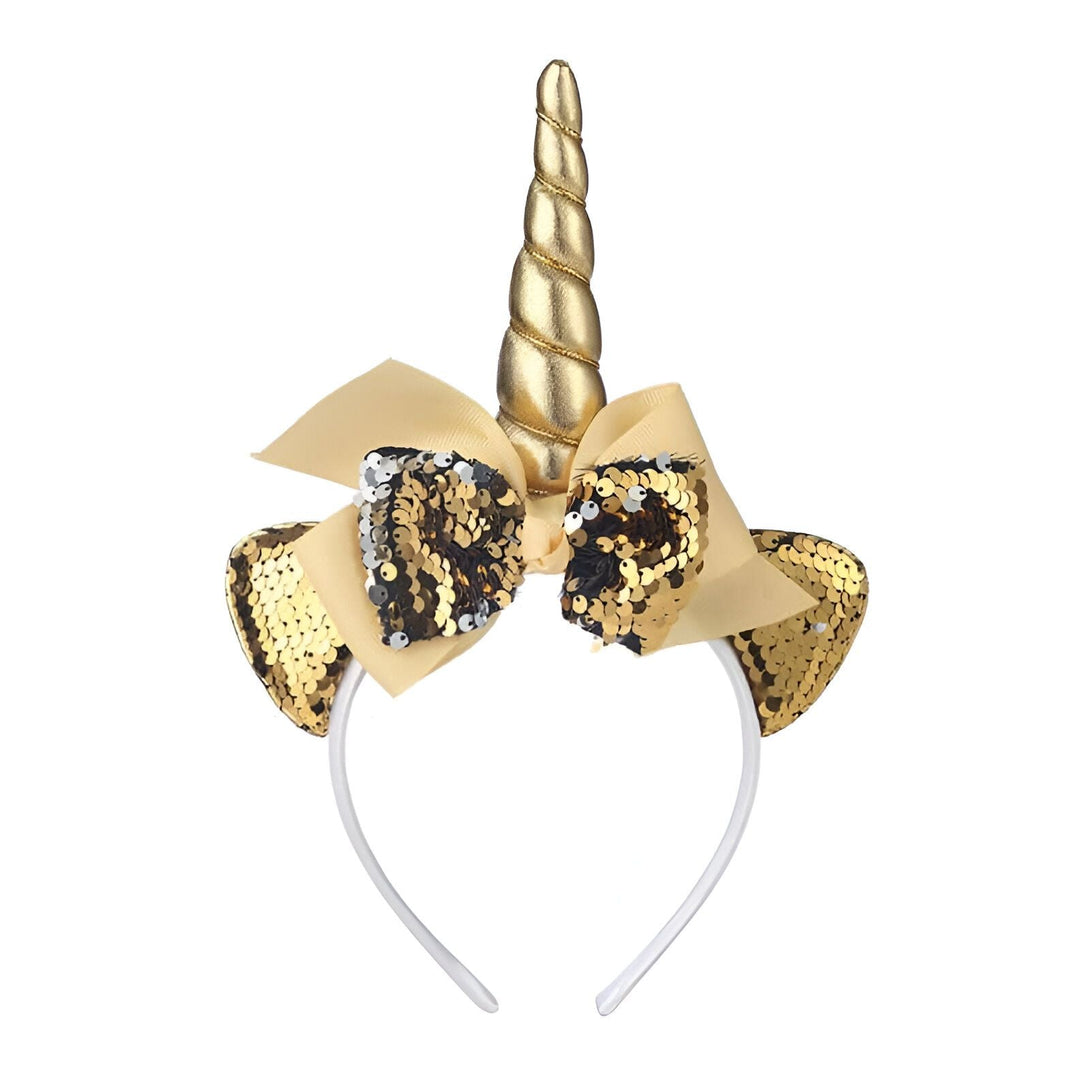 Serre-tête licorne doré avec corne brillante, nœud en satin beige et oreilles scintillantes à paillettes dorées. Accessoire de déguisement fantaisie., 45501339992319 | Licorne Shop