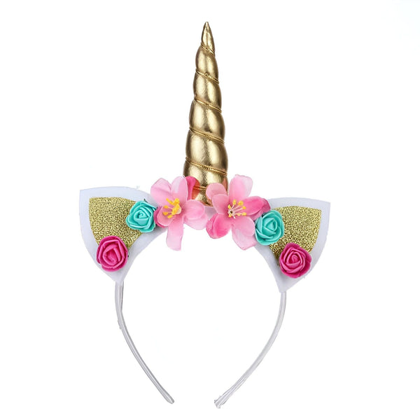 Serre-tête licorne avec une corne dorée, des oreilles blanches pailletées or et des fleurs roses et turquoises. Accessoire de déguisement pour enfants sur fond blanc., 45501336223999 | Licorne Shop