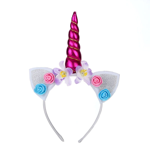 Serre-tête licorne festif avec une corne rose torsadée, des oreilles blanches pailletées et décoré de fleurs roses, bleues et violettes. Accessoire fantaisie pour enfant ou déguisement., 45501334520063 | Licorne Shop