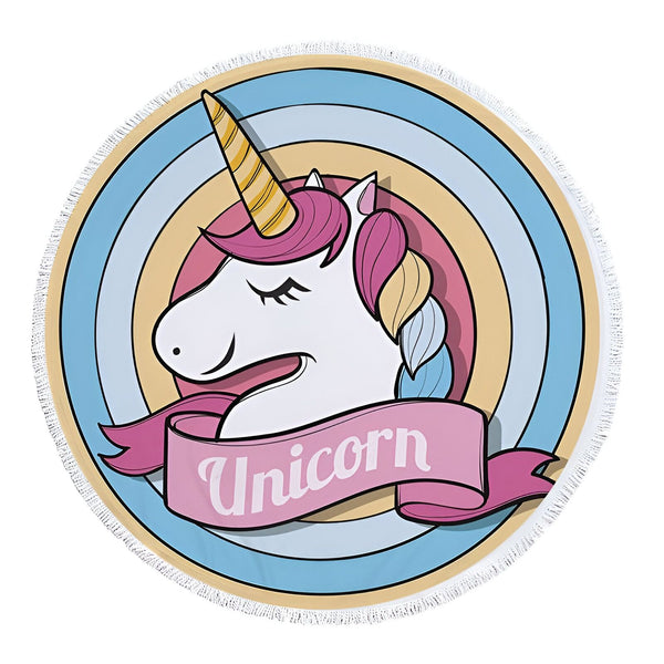 Serviette de plage ronde avec motif d'une licorne blanche à crinière rose et corne dorée, sur un fond rayé bleu, jaune et rose. Un ruban rose portant le mot "Unicorn" complète le design., 45501226320127 | Licorne Shop
