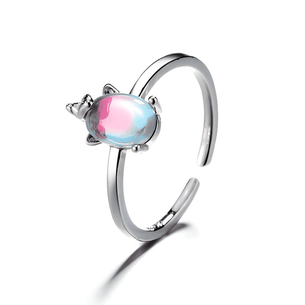 Bague ajustable argentée avec une petite tortue sertie d'une pierre irisée rose et bleue. Bijou fantaisie délicat., 45501371744511 | Licorne Shop