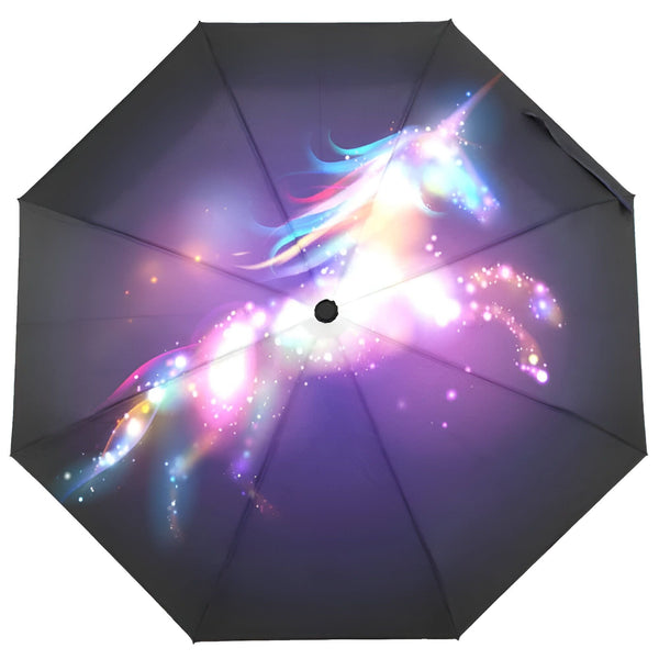 Parapluie ouvert vu d'en haut, illustré d'une licorne arc-en-ciel lumineuse sur fond violet foncé étoilé., 45501168156927 | Licorne Shop