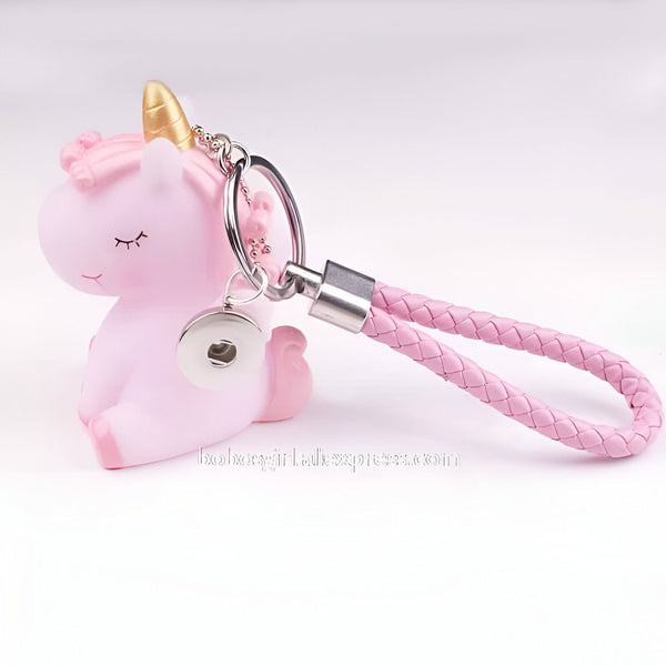 Porte-clés licorne rose avec corne dorée et dragonne tressée rose. Accessoire mignon et girly. Idéal pour décorer un sac à main ou un trousseau de clés., 45501159080191 | Licorne Shop