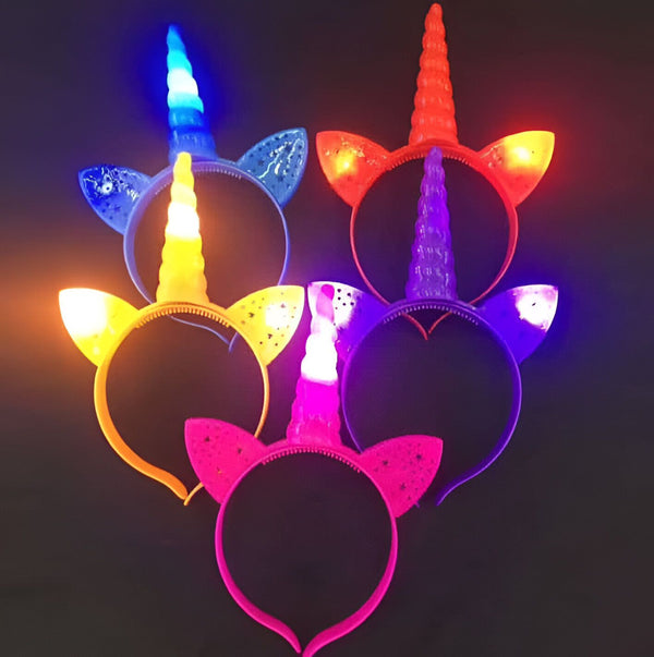 Divers serre-têtes licorne lumineux de couleurs variées (bleu, orange, jaune, violet, rose) avec cornes brillantes et oreilles décoratives, parfaits pour fêtes et déguisements., 45501375676671 | Licorne Shop