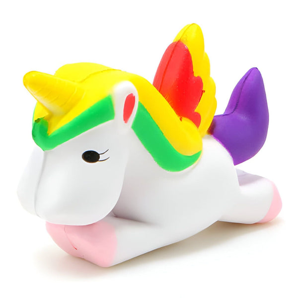 Squishy licorne blanche avec crinière et ailes multicolores (jaune, vert, rouge), queue violette, yeux fermés. Jouet anti-stress en forme d'animal fantastique., 45502408818943 | Licorne Shop