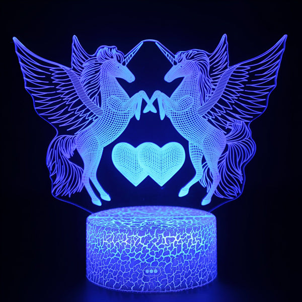 Lampe 3D décorative avec deux licornes ailées se faisant face au-dessus de deux cœurs, éclairée en bleu vif, reposant sur un socle rond lumineux craquelé. Éclairage féérique, cadeau original., 45501048258815 | Licorne Shop
