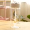 bouteille-d-eau-enfant-licorne-400-ml-1a.jpg Bouteille d'eau transparente avec couvercle et paille, motif de licorne à vélo, inscription "Just believe in your dreams", style enfantin., 45501177561343 | Licorne Shop