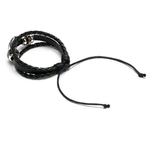 bracelet-licorne-enfant-tresse-8a.jpg Un bracelet en cuir tressé noir avec un fermoir en métal.