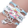 bracelet-licorne-tresse-multi-rangs-bleu-et-blanc-1a.jpg Bracelet multicolore avec un médaillon licorne et un breloque oiseau argenté. Bijou fantaisie pour fille, cadeau idéal pour les fans d'unicorne. Accessoire de mode tendance avec des cordons bleus et blancs tressés., 45501397565695 | Licorne Shop
