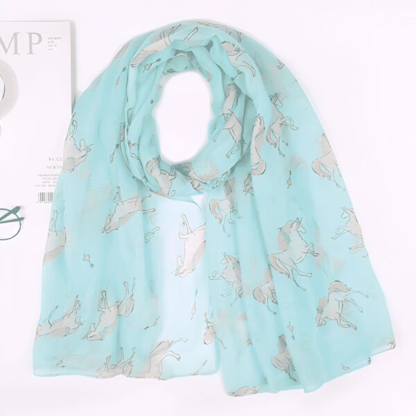 echarpe-licorne-fantaisie-pour-enfant-1a.jpg Écharpe turquoise légère avec motif de licornes, accessoire de mode élégant et original. Motif équestre délicat, style unique., 45502079566079 | Licorne Shop
