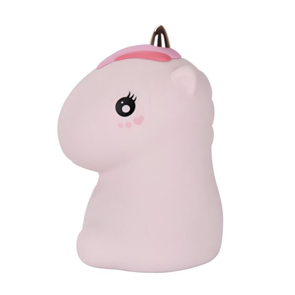 Une veilleuse licorne en silicone rose avec une crinière et une corne rose gold.