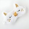 masque-de-sommeil-licorne-blanc-et-or-1a.jpg Masque de sommeil licorne blanc en peluche avec détails dorés (corne, oreilles, étoiles). Accessoire de nuit confortable et fantaisiste., 45501054320895 | Licorne Shop