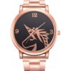 montre-fantaisie-doree-licorne-rose-pour-femme-1a.jpg Montre-bracelet unisexe en or rose avec cadran noir et motif de dragon doré. Affichage analogique avec chiffres 12, 3 et 9., 45501318594815 | Licorne Shop