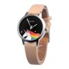 montre-licorne-arc-en-ciel-or-1a.jpg Une montre analogique avec un bracelet en cuir beige et un cadran noir avec une licorne arc-en-ciel.
