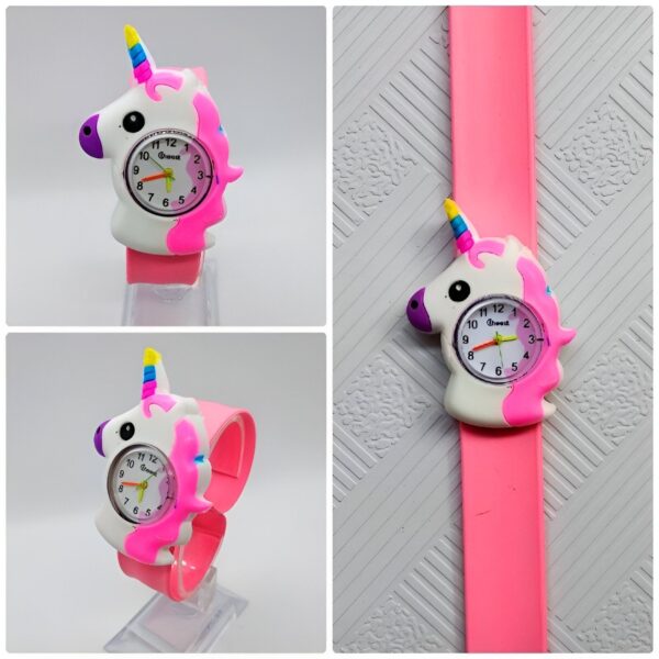 montre-slap-licorne-rose-2a.jpg Une montre licorne rose avec un bracelet en silicone. La montre a un cadran blanc avec des chiffres arabes noirs. La trotteuse est rose et l'aiguille des minutes est bleue. La montre est résistante à l'eau jusqu'à 30 mètres.