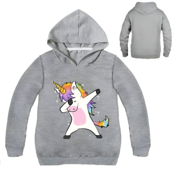 Une illustration d'une licorne dansant le dab. La licorne est blanche avec une crinière et une queue arc-en-ciel. Elle porte une étoile jaune sur le front et des étoiles roses sur les joues. Elle est entourée d'étoiles multicolores.