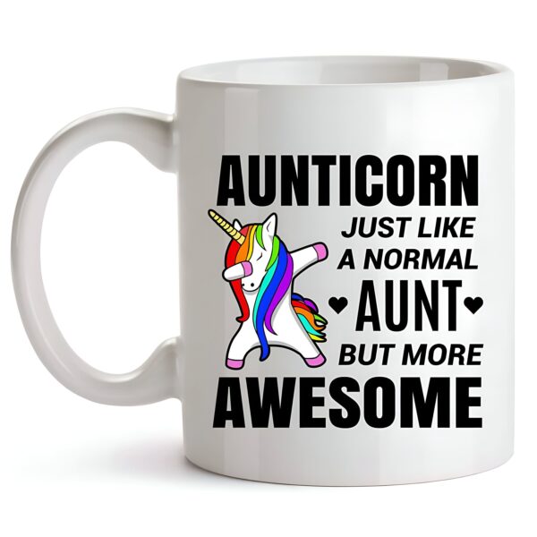 tasse-licorne-avec-message-drole-1a.jpg Mug blanc avec un dessin humoristique d'une tante licorne "Aunticorn". Le texte indique "Aunticorn, juste comme une tante normale mais plus géniale" avec un dessin d'une licorne faisant un dab. Cadeau parfait pour une tante spéciale., 45501189652735 | Licorne Shop