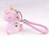 un-porte-cles-licorne-lumineux-decapsuleur-1a.jpg Porte-clés licorne rose avec corne dorée et dragonne tressée rose. Accessoire mignon et girly. Idéal pour décorer un sac à main ou un trousseau de clés., 45501159080191 | Licorne Shop